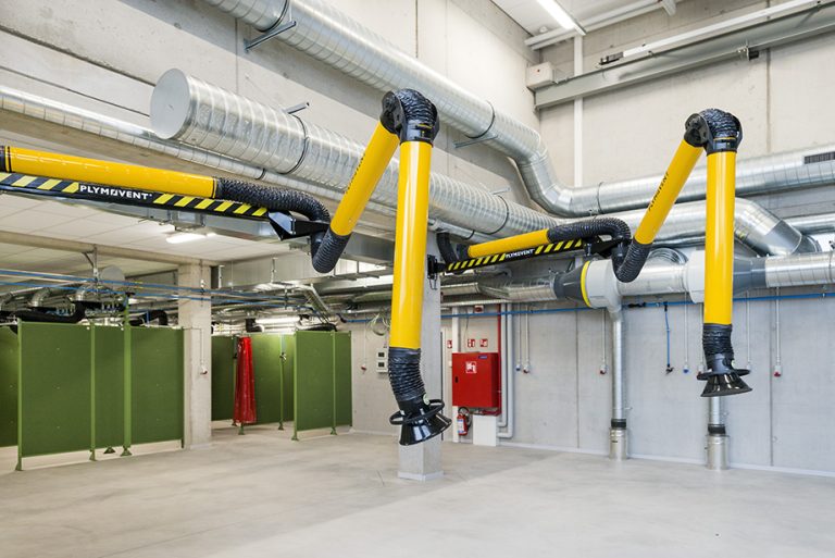 Stationary welding fume filtration system with extraction arms