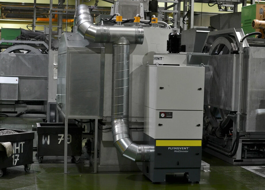 Plymovent MistEliminator oil-mist filter connected to CNC machinery and extraction ductwork